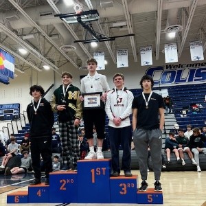 Wrestlers on podium 3